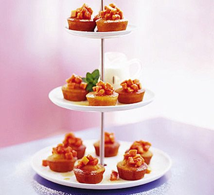 Orange soured cream cakes with syruped papaya