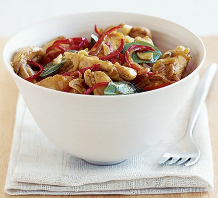 Ken Hom's stir-fried chicken with chillies & basil