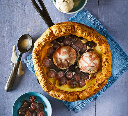 Dutch baby pancake with drunken cherries